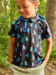 The Lil Bodacious Cretaceous (Toddler Performance Polo) - Image 1 - Chubbies Shorts